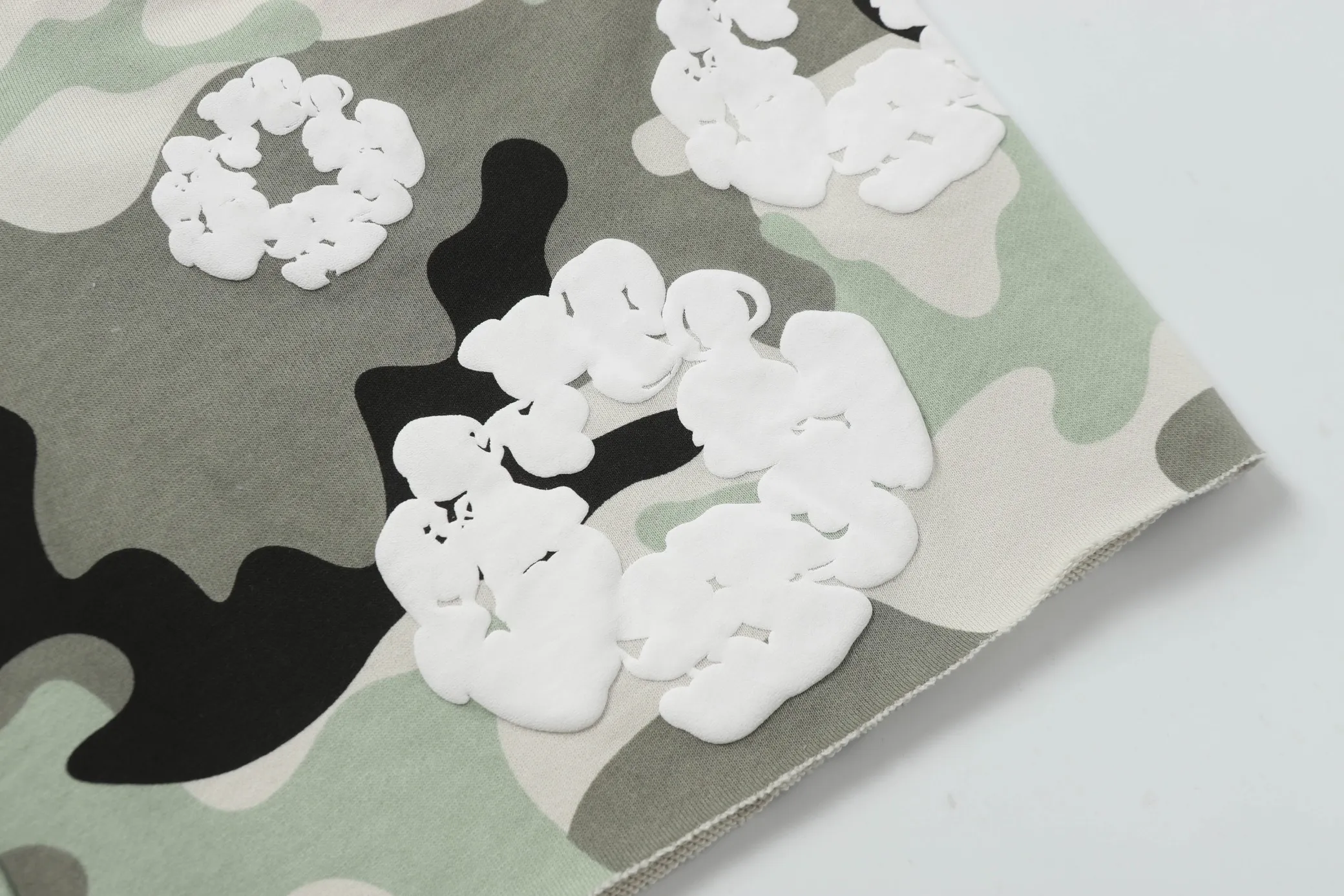 8208# DENIM TEARS Kapok European and American trendy brand high-quality foam flocking camouflage printed shorts Color Camouflage blue Camouflage powder Camouflage gray Camouflage apricot Camouflage green Size S-XL